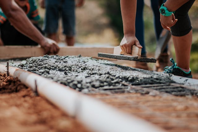 laying foundation with trowel